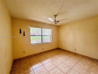 SITUATED IN SOUGHT AFTER PHASE FOUR OF SUNRISE LAKES 55+ on Sunrise Lakes Phase IV Golf Course in Florida - for sale on GolfHomes.com, golf home, golf lot
