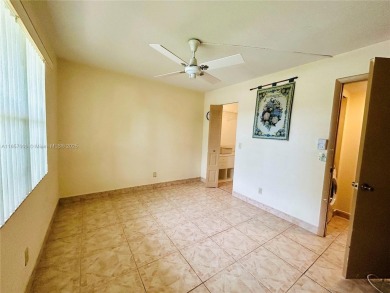 SITUATED IN SOUGHT AFTER PHASE FOUR OF SUNRISE LAKES 55+ on Sunrise Lakes Phase IV Golf Course in Florida - for sale on GolfHomes.com, golf home, golf lot