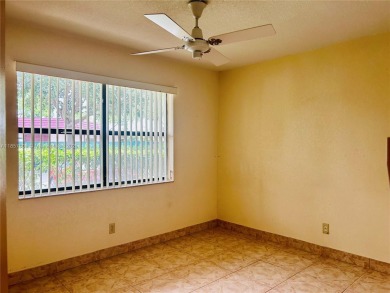 SITUATED IN SOUGHT AFTER PHASE FOUR OF SUNRISE LAKES 55+ on Sunrise Lakes Phase IV Golf Course in Florida - for sale on GolfHomes.com, golf home, golf lot