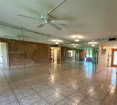 SITUATED IN SOUGHT AFTER PHASE FOUR OF SUNRISE LAKES 55+ on Sunrise Lakes Phase IV Golf Course in Florida - for sale on GolfHomes.com, golf home, golf lot