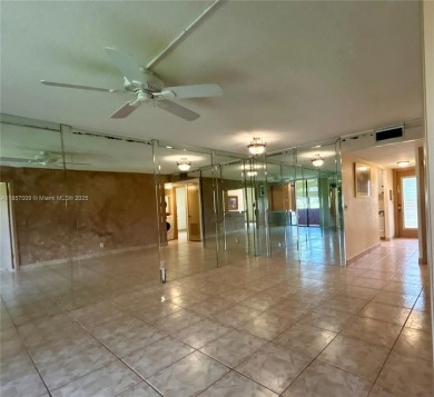 SITUATED IN SOUGHT AFTER PHASE FOUR OF SUNRISE LAKES 55+ on Sunrise Lakes Phase IV Golf Course in Florida - for sale on GolfHomes.com, golf home, golf lot