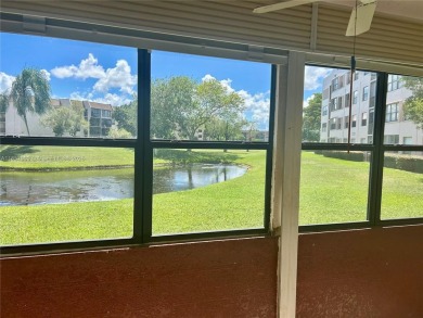 SITUATED IN SOUGHT AFTER PHASE FOUR OF SUNRISE LAKES 55+ on Sunrise Lakes Phase IV Golf Course in Florida - for sale on GolfHomes.com, golf home, golf lot