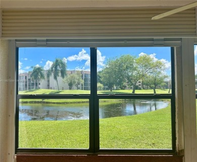 SITUATED IN SOUGHT AFTER PHASE FOUR OF SUNRISE LAKES 55+ on Sunrise Lakes Phase IV Golf Course in Florida - for sale on GolfHomes.com, golf home, golf lot