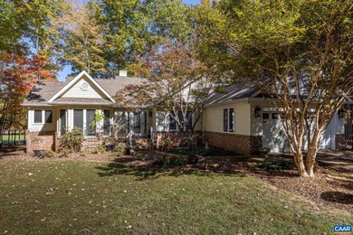 Enjoy peaceful mornings sipping coffee and relaxing evenings on Lake Monticello Golf Course in Virginia - for sale on GolfHomes.com, golf home, golf lot
