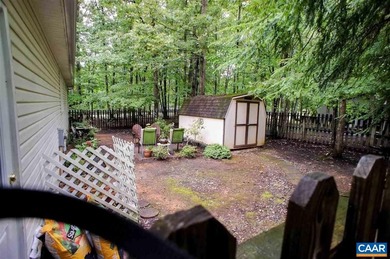 Enjoy peaceful mornings sipping coffee and relaxing evenings on Lake Monticello Golf Course in Virginia - for sale on GolfHomes.com, golf home, golf lot