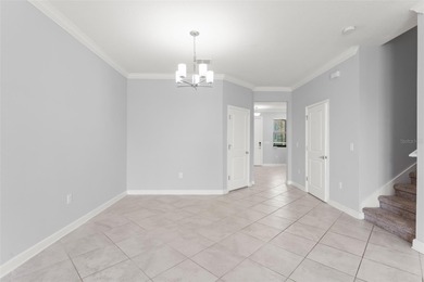 **This house comes with a REDUCED RATE through the seller's on ChampionsGate Golf Resort in Florida - for sale on GolfHomes.com, golf home, golf lot