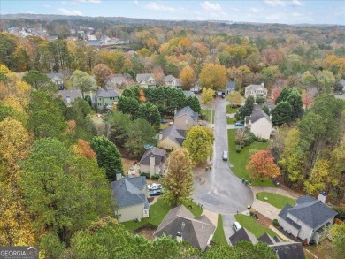 Discover this beautifully updated 4-bedroom, 3.5-bathroom home on Bridgemill Golf Club in Georgia - for sale on GolfHomes.com, golf home, golf lot