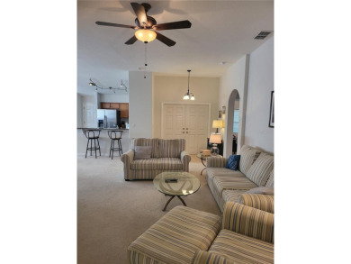 Welcome to this well-maintained 3-bedroom, 2-bathroom on Tampa Bay Golf and Country Club in Florida - for sale on GolfHomes.com, golf home, golf lot