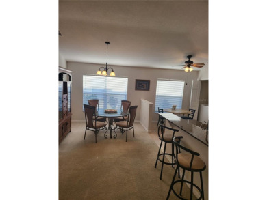 Welcome to this well-maintained 3-bedroom, 2-bathroom on Tampa Bay Golf and Country Club in Florida - for sale on GolfHomes.com, golf home, golf lot