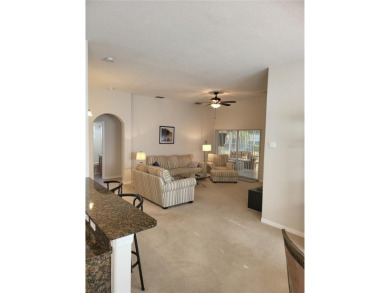 Welcome to this well-maintained 3-bedroom, 2-bathroom on Tampa Bay Golf and Country Club in Florida - for sale on GolfHomes.com, golf home, golf lot
