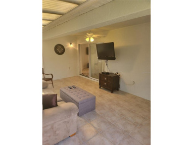Welcome to this well-maintained 3-bedroom, 2-bathroom on Tampa Bay Golf and Country Club in Florida - for sale on GolfHomes.com, golf home, golf lot
