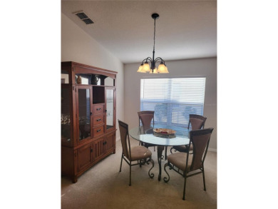 Welcome to this well-maintained 3-bedroom, 2-bathroom on Tampa Bay Golf and Country Club in Florida - for sale on GolfHomes.com, golf home, golf lot