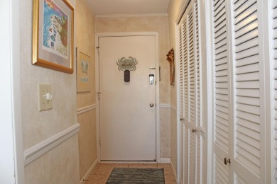 Charming 1-Bedroom Condo with Golf Course & Canal Views in on Sandpiper Cove Golf Course in Florida - for sale on GolfHomes.com, golf home, golf lot