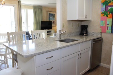 Charming 1-Bedroom Condo with Golf Course & Canal Views in on Sandpiper Cove Golf Course in Florida - for sale on GolfHomes.com, golf home, golf lot