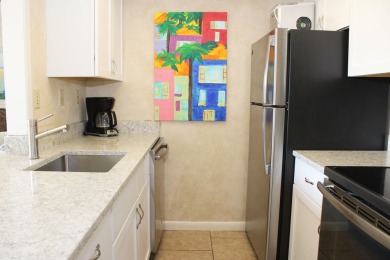 Charming 1-Bedroom Condo with Golf Course & Canal Views in on Sandpiper Cove Golf Course in Florida - for sale on GolfHomes.com, golf home, golf lot