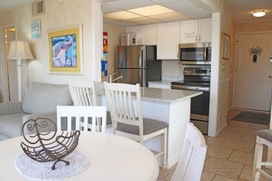 Charming 1-Bedroom Condo with Golf Course & Canal Views in on Sandpiper Cove Golf Course in Florida - for sale on GolfHomes.com, golf home, golf lot