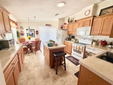 AMAZING CORNER LOT FEATURING A 3-BEDROOM, 2-BATHROOM HOME WITH on Cypress Greens in Florida - for sale on GolfHomes.com, golf home, golf lot