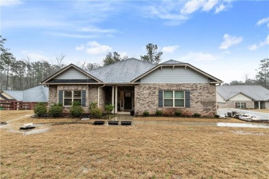 Set in a desirable golf course neighborhood, this stylish on St. Andrews Golf and Country Club in Georgia - for sale on GolfHomes.com, golf home, golf lot