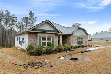 Set in a desirable golf course neighborhood, this stylish on St. Andrews Golf and Country Club in Georgia - for sale on GolfHomes.com, golf home, golf lot