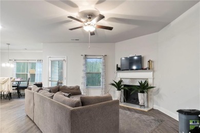 Set in a desirable golf course neighborhood, this stylish on St. Andrews Golf and Country Club in Georgia - for sale on GolfHomes.com, golf home, golf lot