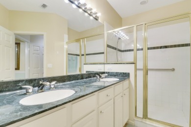 Location, location, location! SERENE LAKE VIEWS & PARTIAL GOLF on The Legacy Golf and Tennis Club in Florida - for sale on GolfHomes.com, golf home, golf lot