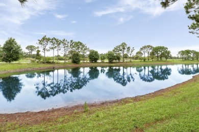 Location, location, location! SERENE LAKE VIEWS & PARTIAL GOLF on The Legacy Golf and Tennis Club in Florida - for sale on GolfHomes.com, golf home, golf lot