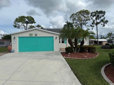 This lovely, 3 bedroom, 2 bath manufactured home is located in on Pine Lakes Country Club in Florida - for sale on GolfHomes.com, golf home, golf lot