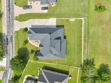 This Luxurious 5-Bedroom Home in Pecan Plantation with Upscale on Pecan Plantation Country Club in Texas - for sale on GolfHomes.com, golf home, golf lot