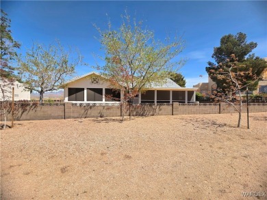 Enjoy golf course living with this spacious 2,094 sq ft home on Valle Vista Golf Course in Arizona - for sale on GolfHomes.com, golf home, golf lot