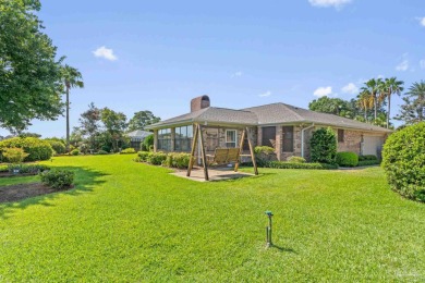Charming Gulf Breeze brick home nestled in a picturesque setting on Tiger Point Golf and Country Club in Florida - for sale on GolfHomes.com, golf home, golf lot