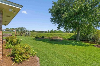 Charming Gulf Breeze brick home nestled in a picturesque setting on Tiger Point Golf and Country Club in Florida - for sale on GolfHomes.com, golf home, golf lot