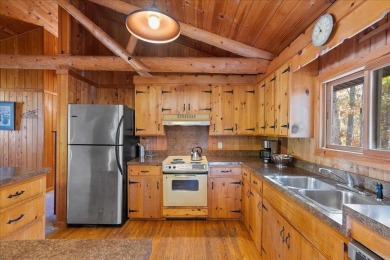 Stunning Contemporary log home, private lot backing up to wooded on Woodstone Meadows Golf Course At Massanutten in Virginia - for sale on GolfHomes.com, golf home, golf lot
