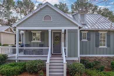 CHARMING LOCK AND LEAVE GOLF COTTAGE ON THE 12TH HOLE OF THE on Reynolds Lake Oconee - The Landing in Georgia - for sale on GolfHomes.com, golf home, golf lot