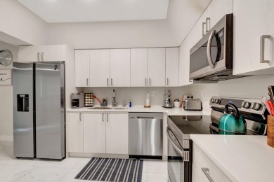 Enjoy the Florida lifestyle in this gorgeous 3rd-floor condo in on Boca Grove Golf and Tennis in Florida - for sale on GolfHomes.com, golf home, golf lot