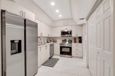 Enjoy the Florida lifestyle in this gorgeous 3rd-floor condo in on Boca Grove Golf and Tennis in Florida - for sale on GolfHomes.com, golf home, golf lot