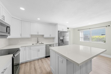 Experience resort-style living in this beautifully renovated on Kings Point Golf -Flanders Way in Florida - for sale on GolfHomes.com, golf home, golf lot