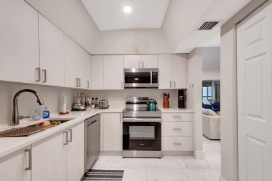 Enjoy the Florida lifestyle in this gorgeous 3rd-floor condo in on Boca Grove Golf and Tennis in Florida - for sale on GolfHomes.com, golf home, golf lot