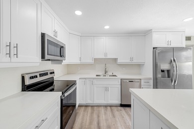 Experience resort-style living in this beautifully renovated on Kings Point Golf -Flanders Way in Florida - for sale on GolfHomes.com, golf home, golf lot