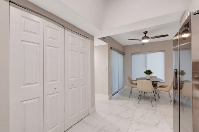 Enjoy the Florida lifestyle in this gorgeous 3rd-floor condo in on Boca Grove Golf and Tennis in Florida - for sale on GolfHomes.com, golf home, golf lot