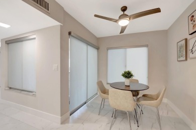 Enjoy the Florida lifestyle in this gorgeous 3rd-floor condo in on Boca Grove Golf and Tennis in Florida - for sale on GolfHomes.com, golf home, golf lot