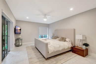 Enjoy the Florida lifestyle in this gorgeous 3rd-floor condo in on Boca Grove Golf and Tennis in Florida - for sale on GolfHomes.com, golf home, golf lot