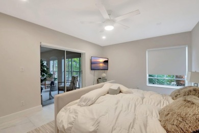 Enjoy the Florida lifestyle in this gorgeous 3rd-floor condo in on Boca Grove Golf and Tennis in Florida - for sale on GolfHomes.com, golf home, golf lot