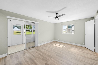 Experience resort-style living in this beautifully renovated on Kings Point Golf -Flanders Way in Florida - for sale on GolfHomes.com, golf home, golf lot