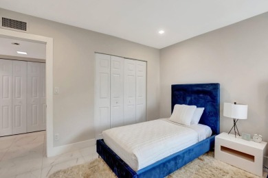 Enjoy the Florida lifestyle in this gorgeous 3rd-floor condo in on Boca Grove Golf and Tennis in Florida - for sale on GolfHomes.com, golf home, golf lot