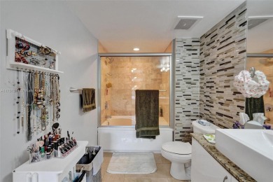 BEAUTIFUL 2 BED & 2 BATH CONDOMINIUM AT TURNBERRY ON THE GREEN on Turnberry Isle Resort and Club in Florida - for sale on GolfHomes.com, golf home, golf lot