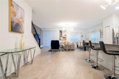 Fully Furnished Corner Townhouse in ChampionsGate - 5 Beds | 4 on National Golf Course in Florida - for sale on GolfHomes.com, golf home, golf lot