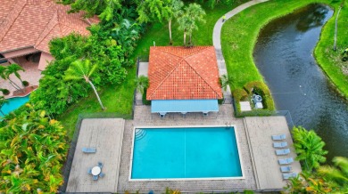 Enjoy the Florida lifestyle in this gorgeous 3rd-floor condo in on Boca Grove Golf and Tennis in Florida - for sale on GolfHomes.com, golf home, golf lot