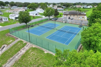 Discover the perfect blend of comfort and convenience in this on Sandpiper Golf Club in Florida - for sale on GolfHomes.com, golf home, golf lot