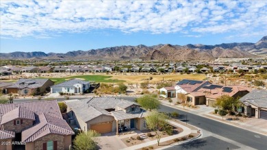 Take in the spectacular views of the mountains and the golf on Verrado Golf Club - Victory in Arizona - for sale on GolfHomes.com, golf home, golf lot