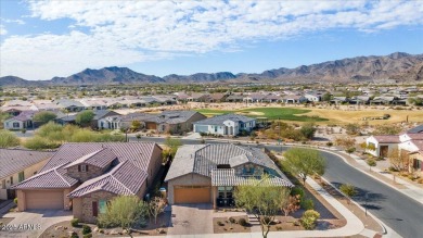 Take in the spectacular views of the mountains and the golf on Verrado Golf Club - Victory in Arizona - for sale on GolfHomes.com, golf home, golf lot